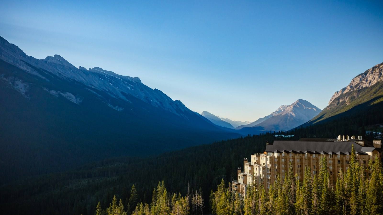 Rimrock Banff above the forested Bow Valley, with the Canadian Rockies beyond