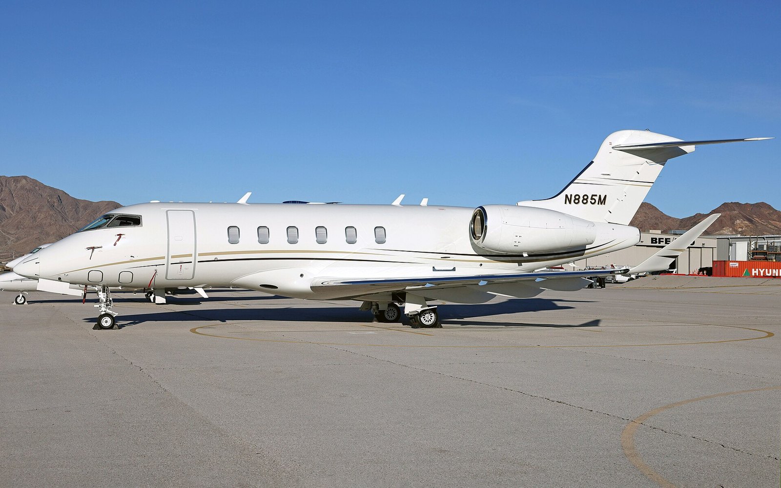 A Bombardier Challenger 350 business jet on the ground (generic business jet imagery for an explainer that names no specific aircraft)