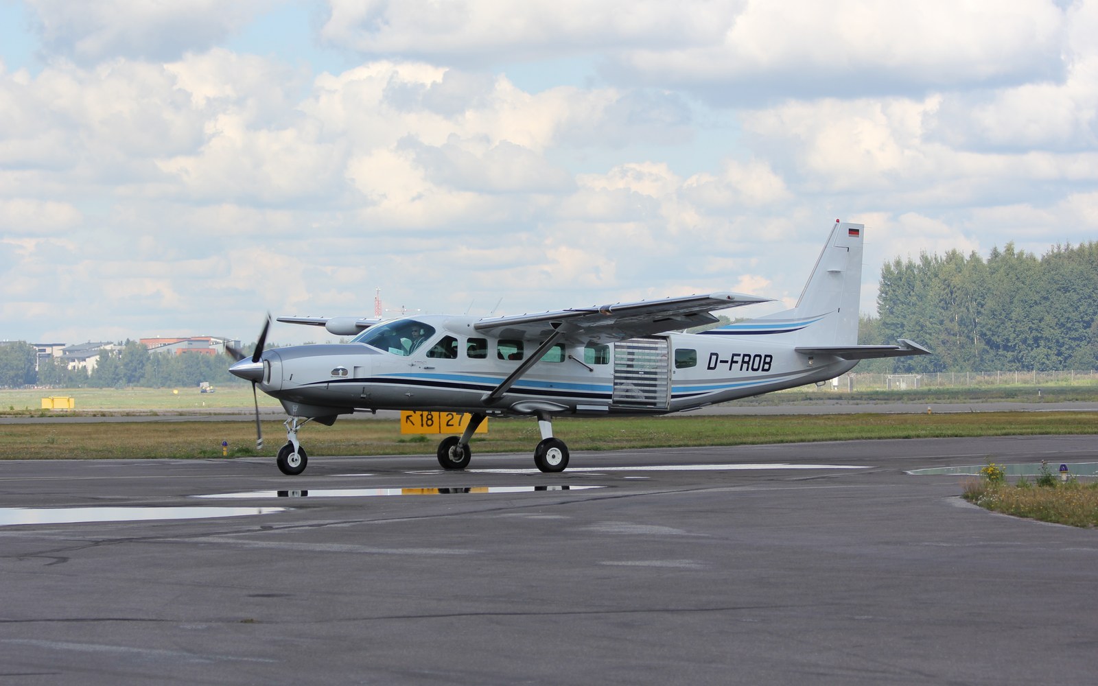 A Cessna 208B Grand Caravan taxiing; representative of the aircraft type, not Joby's converted J208
