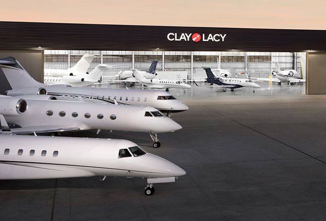 Clay Lacy's hangar at Van Nuys Airport with parked business jets