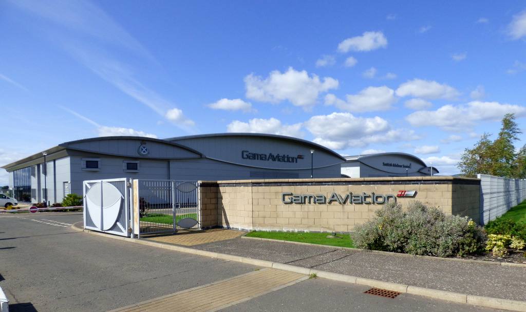 Gama Aviation building at Glasgow Airport with company signage