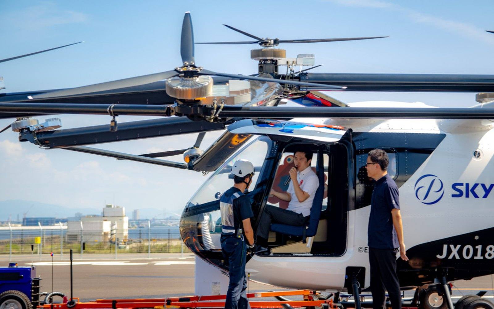 Hirofumi Yoshimura seated inside the SkyDrive SD-05 eVTOL aircraft