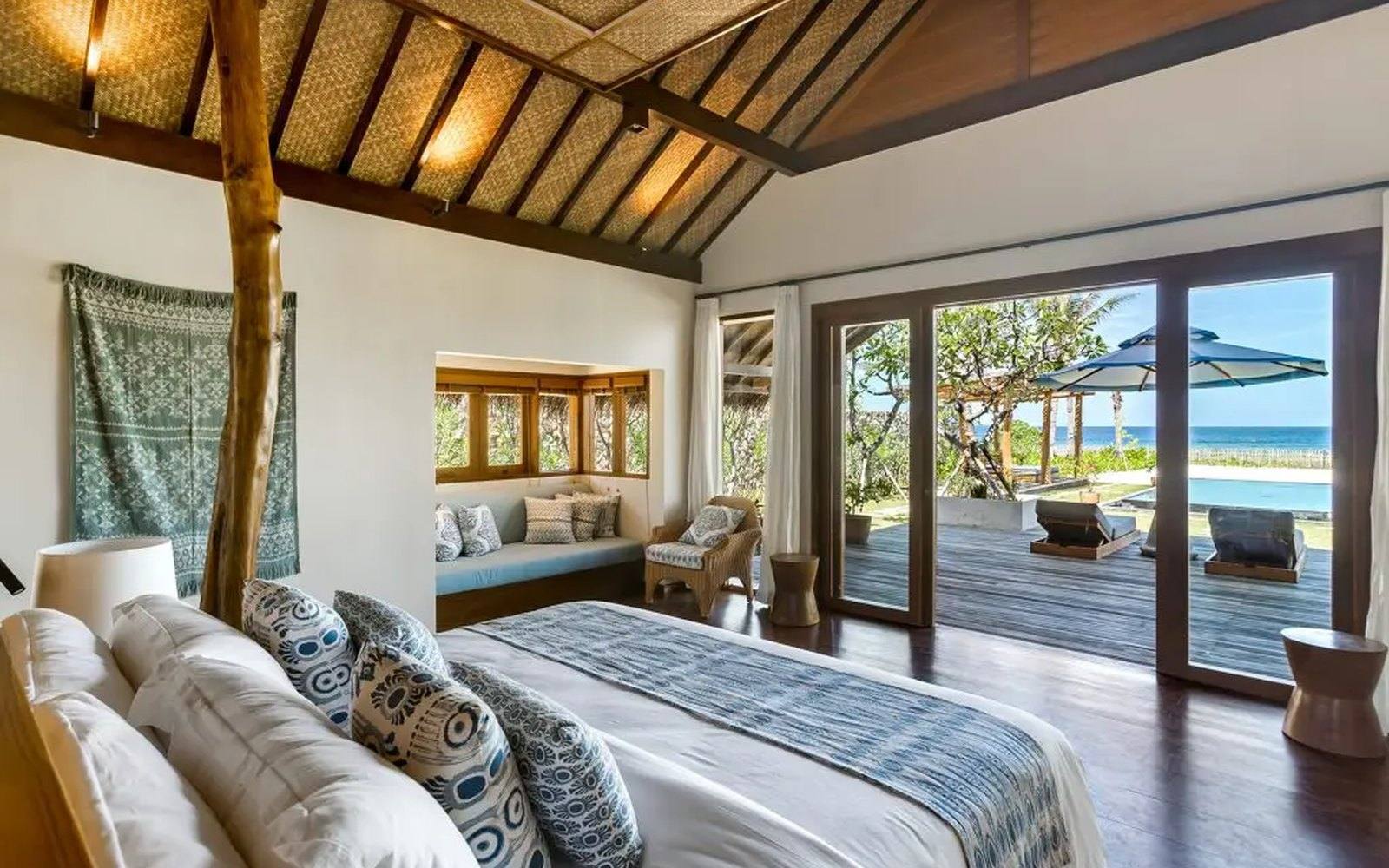 Inside a beachfront villa at NIHI Rote, looking out toward Bo’a Beach