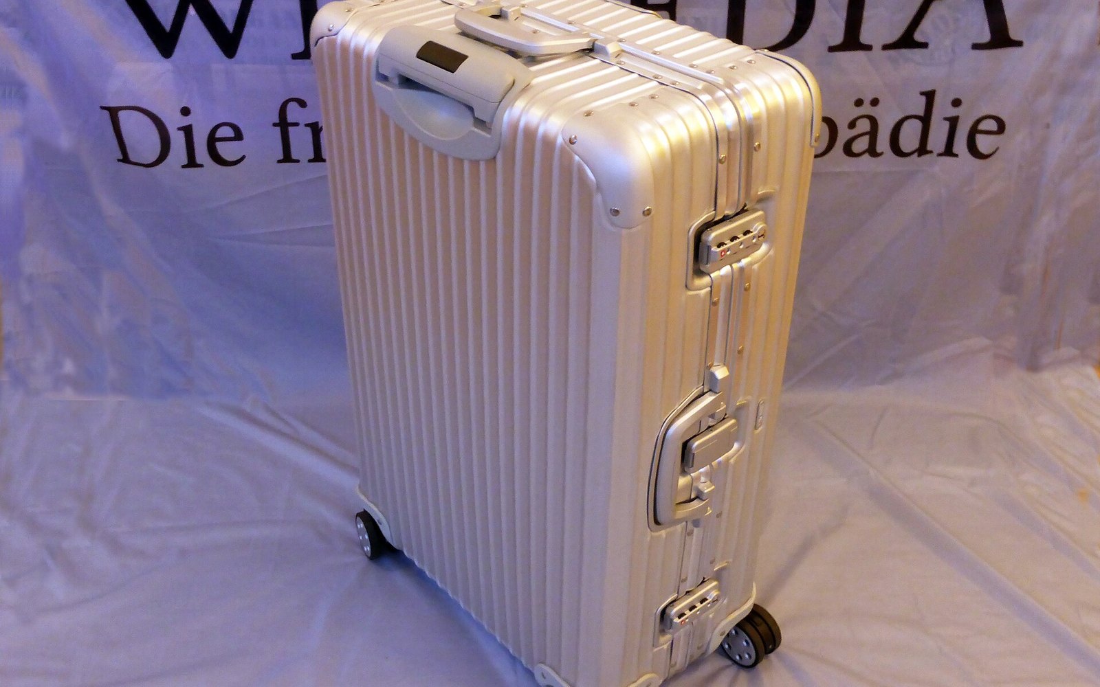A RIMOWA aluminum suitcase in the grooved Topas line, the predecessor of the current Original